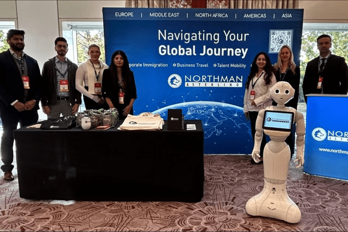 The Northman Sterling Legal stand at the FEM EMEA Summit 2023, featuring the robot Pepper